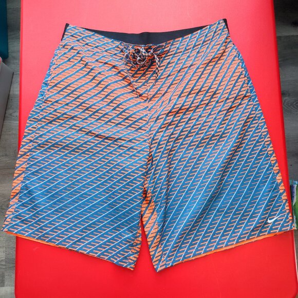 Nike swim trunk orange blue design men's size 36 - Picture 1 of 8